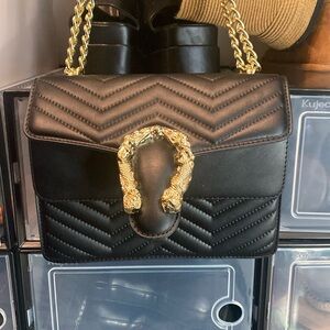 Adjustable strap faux leather purse